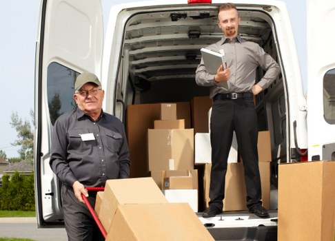 Packing materials and labelled moving boxes prepared for a Shoreditch home move