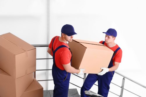 Removal team planning a move on a busy Shoreditch street