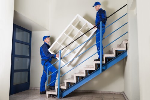 Local removals support for a Shoreditch apartment move with boxes and furniture