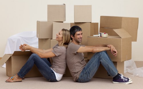 Team loading a vehicle safely with secured furniture